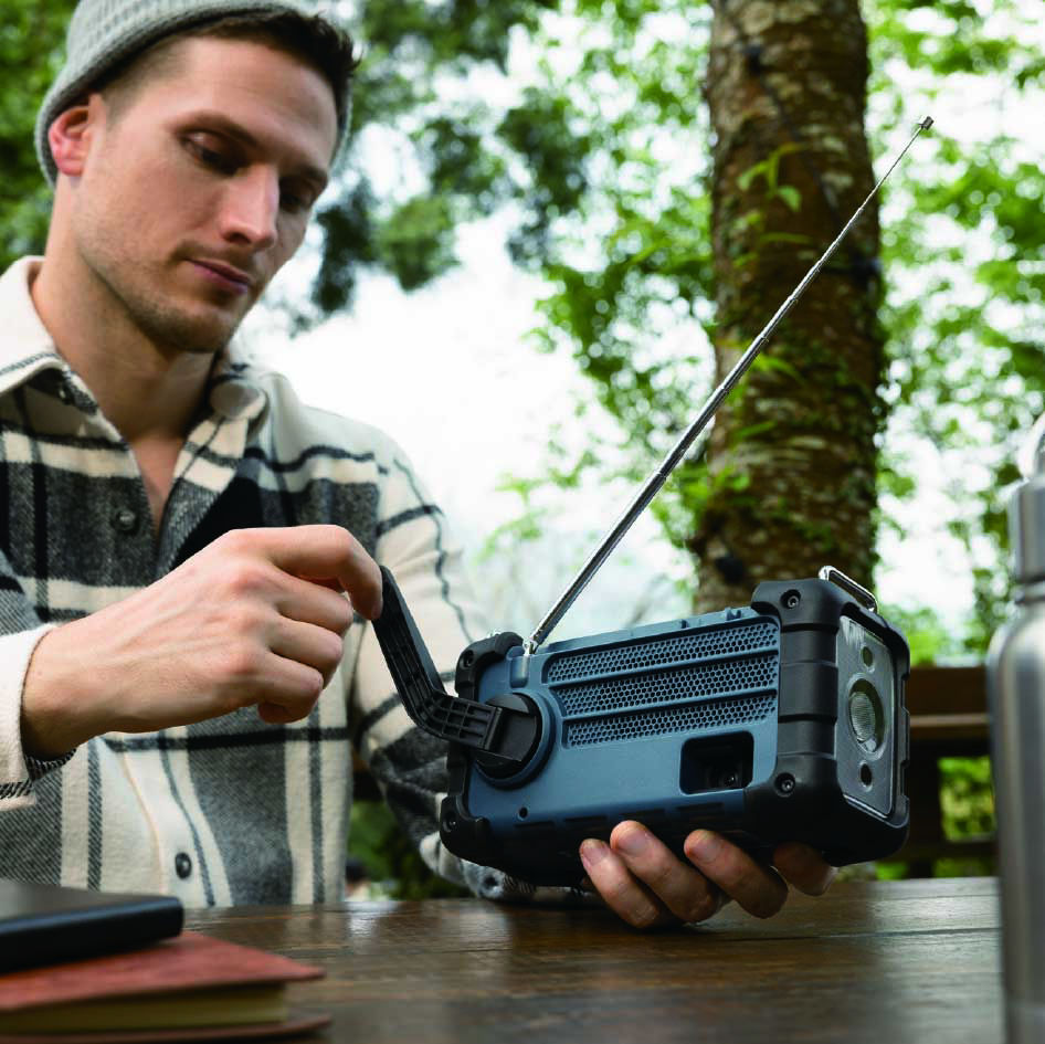 a man is operating MMR-99 radio