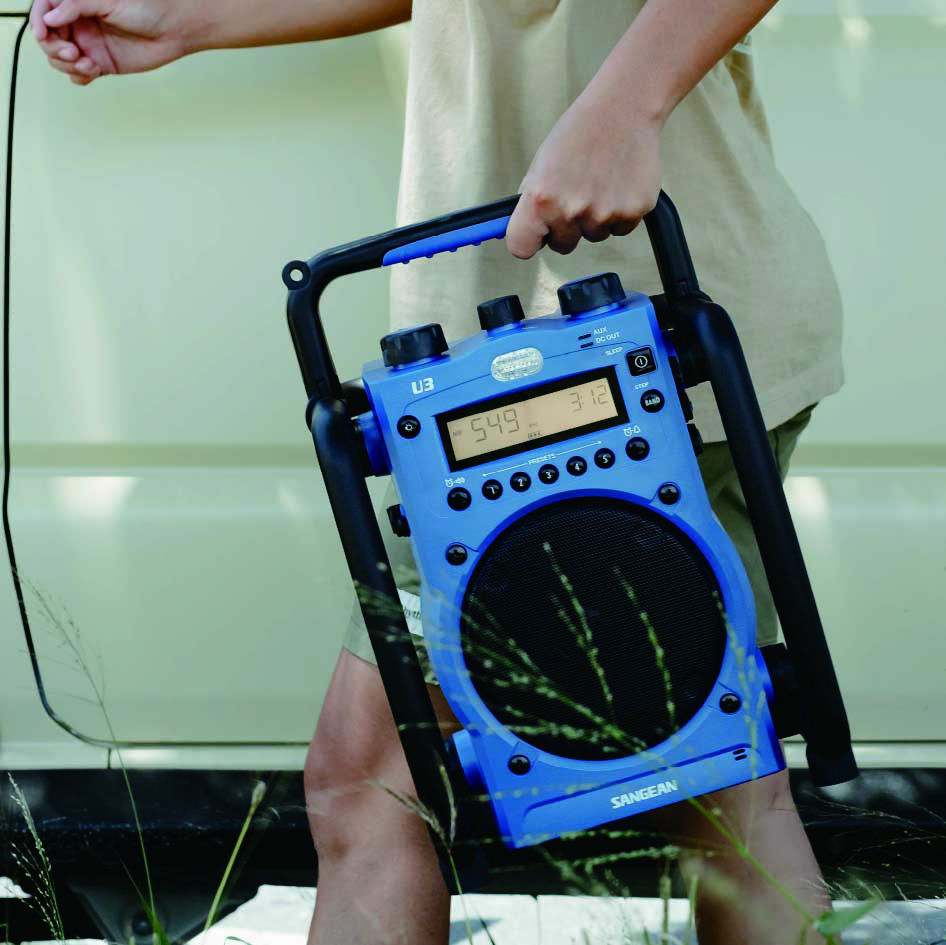 a man is carring SANGEAN U3