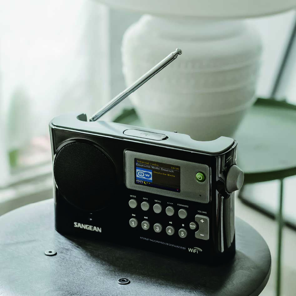 A SANGEAN WFR-28, black, on a chair